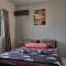 Greenage Seaview Bay Villa with stunning sunset - Putatan