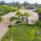 Villa Neptunes Grotto- BRAND NEW with heated Pool, Hot Tub, and dock with Tiki