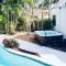 Tropical paradise! Walking distance to the beach!