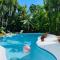 Tropical paradise! Walking distance to the beach!