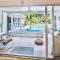 Tropical paradise! Walking distance to the beach!