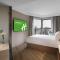 Holiday Inn Shanghai Huaxia by IHG - overlooking city scenery at Sky View Restaurant