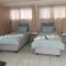 Phindulo Bed and Breakfast - No Loadshedding, Smart TVs & unlimited free fibre wifi - Krugersdorp