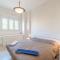 GuestHost - Comfy Apartment with Private Parking