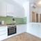 GuestHost - Comfy Apartment with Private Parking