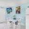 Breezy condo with deluxe pool and private beach access