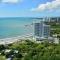 Fantastic Beach condo with pool and mountain views