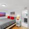 The Americana 4 bedroom with spa and bikes, seps to the beach