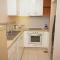 Your 2BR Luna Retreat with Beach Access in Al Rahba - Abú Zabí