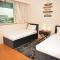 Your 2BR Luna Retreat with Beach Access in Al Rahba - Abú Zabí