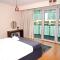 Your 2BR Luna Retreat with Beach Access in Al Rahba - Abú Zabí