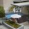 Your 2BR Luna Retreat with Beach Access in Al Rahba - Abú Zabí