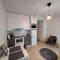 Best location studio in town right next to the train station and free parking Kotimaailma Apartments