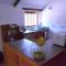 Cozy, open plan barn with log burner