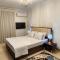 Modern Apartment in Sheraton Heliopolis, 5 minutes from Cairo Airport عمارة مطعم دجاج كنساس