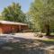 Riverfront Covington Cabin with Deck and Fire Pit!