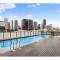 Rooftop Pool 2BR Apt at Marvel Stadium with Free Parking