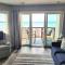 Beachside 213 with Pool Hot Tub and Private Deck overlooking East Bay - Траверс-Сити