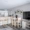 Beachside 213 with Pool Hot Tub and Private Deck overlooking East Bay - Траверс-Сити