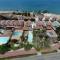 Greek Island Style 2 bedroom Villa with Pool next to the Sea