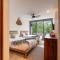 NHOA 208C Lux 1BR Condo Jungle View in Aldea Zama