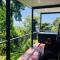 Sky: rainforest and ocean views with jacuzzi