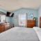 7030 - Waves Against the Machine by Resort Realty