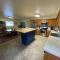 JI13- ,A two bedroom, one bath house with den, covered outdoor dining area and fenced in yard at our Joplin Inn home