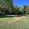 JI13- ,A two bedroom, one bath house with den, covered outdoor dining area and fenced in yard at our Joplin Inn home