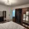 Modern Apartment in Sheraton Heliopolis, 5 minutes from Cairo Airport عمارة مطعم دجاج كنساس