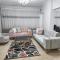 Modern Apartment in Sheraton Heliopolis, 5 minutes from Cairo Airport عمارة مطعم دجاج كنساس - El Cairo