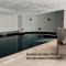 Appartement moderne central avec piscine, garage privé et terrasse sud