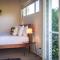 Kulang Retreat in charming Broke with Large Swim Spa and games room suits up to 14 guests