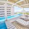 Casa Las Palmas - Condos by the Beach with Rooftop Pool