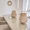 Casa Las Palmas - Condos by the Beach with Rooftop Pool