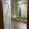 Flat em Tropical Executive Hotel