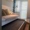 Cozy Penthouse 2BR Suite w Balcony - Amazing Manila Bay View and City Skyline near MOA