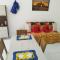 Sol Apartamento 4 - Quarto e sala com varanda e cozinha americana na praia do prea-CE