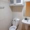 SnugglePod Condotel - Grand Riviera Suites