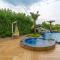 StayVista at Serenity Farms with Pool, Lawn, Bonfire & BBQ