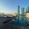 Cloud9 Waterfront Luxury Condo - Manama