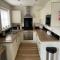 High Tide Cottage - Part of the The Bay Filey Holiday Village with pool, gym and direct beach access, pub, restaurant, tennis and meadows walks