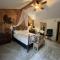 C19, One bedroom luxury, log-sided Couples Cottage with private hot tub and unique extras cottage