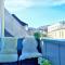 Central 2BR with balconies and art in historical university area