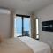 Vistas al Mar en Exclusivo Apartamento con Garage