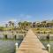Walk to Florabama from Renovated Ground Floor 2Bd-2Ba with Pickleball, Boat Slips - بينساكولا