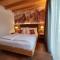 DOLOMITES B&B - Suites, Apartments and SPA