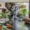 Waikiki Banyan Oasis with Partial Ocean View, 1-Block to Beach, Free Parking - Honolulu