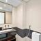 StoneTree - Stylish 1BR & Pool with Burj Khalifa Views - Dubaj