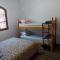 Casa Rosa de Peruíbe - Casa de Temporada 3 dormitórios, 10 hóspedes, piscina, wi-fi, netflix, 800 metros da praia